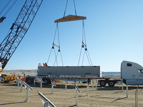 Photo 11. Electrical vaults get installed.