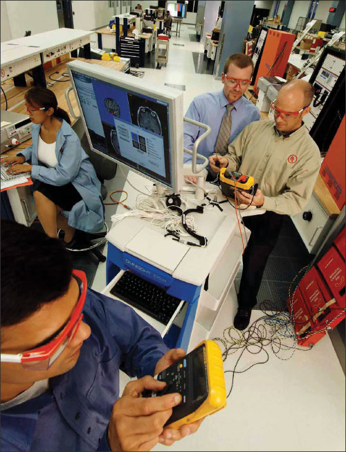 Compliance Standards. A UL project engineer and reviewing engineer conducting a preliminary review of a medical monitoring system for compliance with the safety standard.