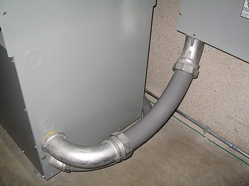 Photo 9. A correct use of raceway fittings and LFMC between electrical equipment